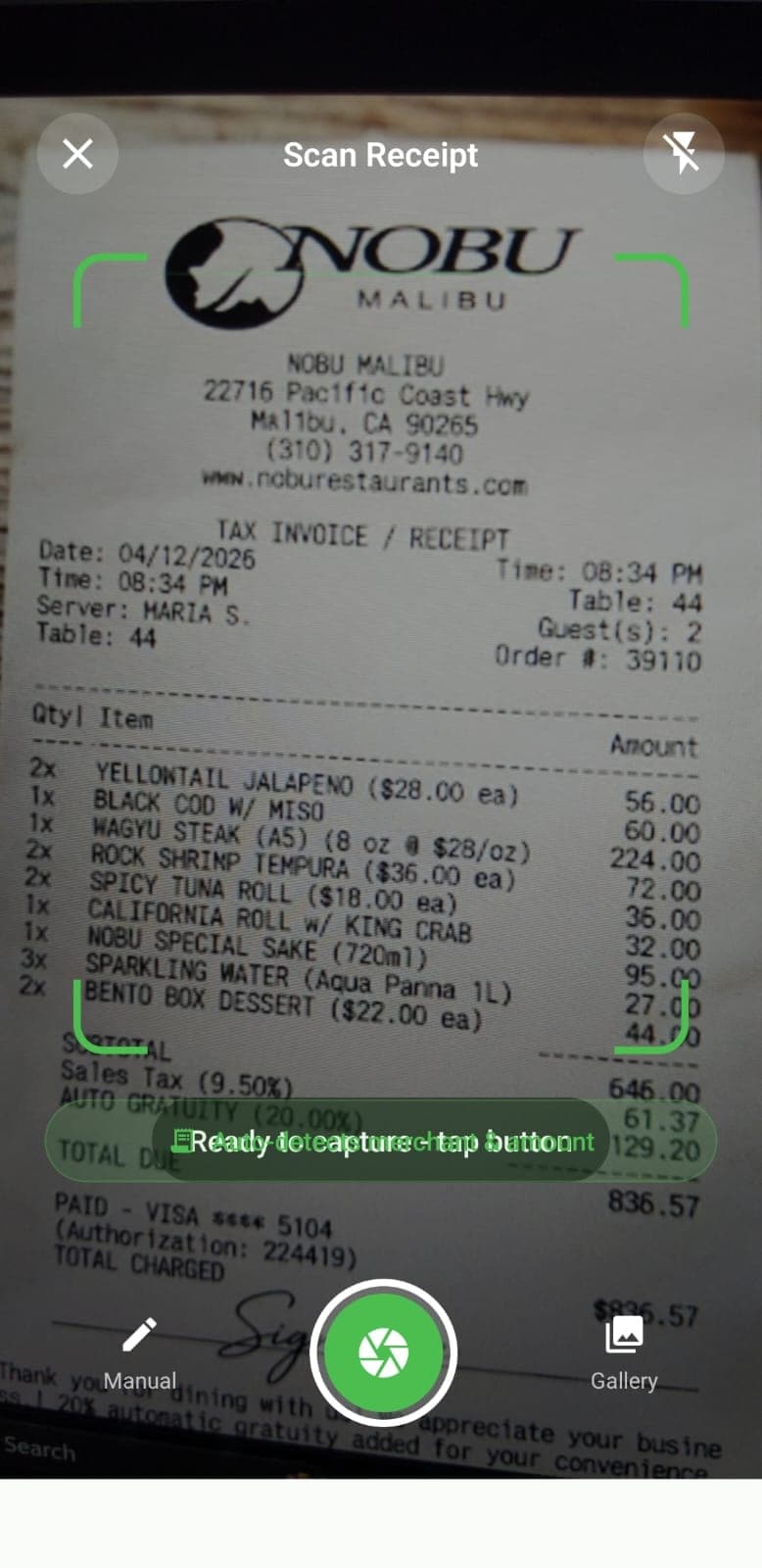 SnapExpense receipt scanning camera view with green corner brackets